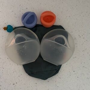 Boon Trove silicone milk collectors with plugs